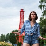 woman in blue and white striped button up shirt