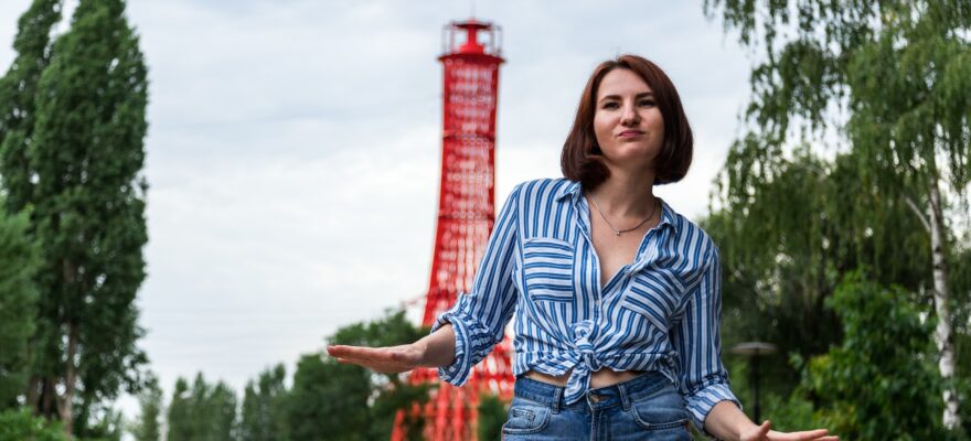 woman in blue and white striped button up shirt